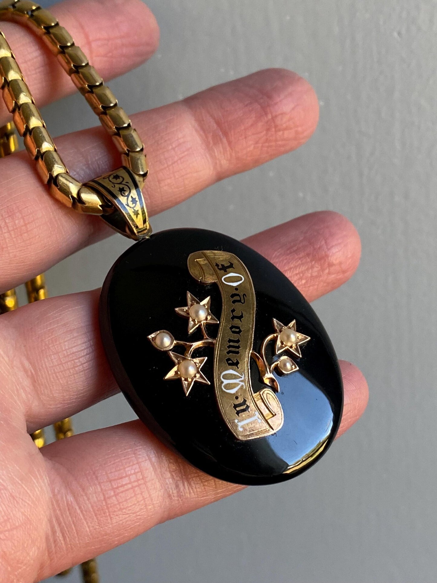 Antique Victorian Oversized Carved Onyx "In Memory Of" Locket Pendant with a Pearl Bramble of Flowers and Enameled Bale in 14k Gold, 1800's