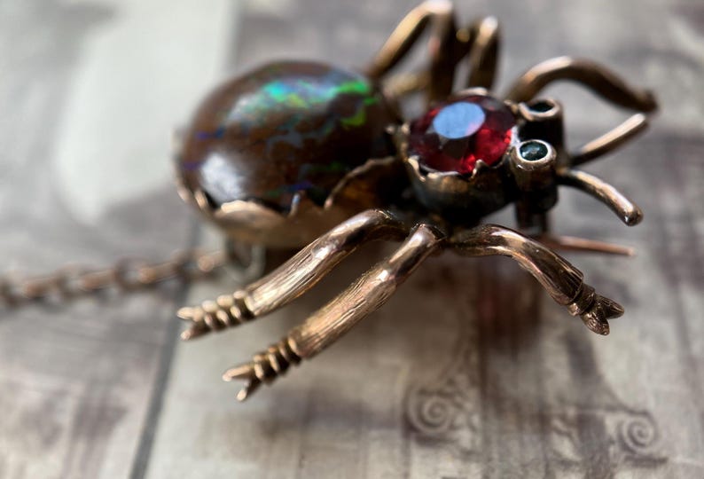 Antique Victorian Boulder Opal Spider with Garnet Head Brooch in 9k Rose Gold circa 1890, Bug, Insect, Pin, Three-Dimensional, Figural, 1800's