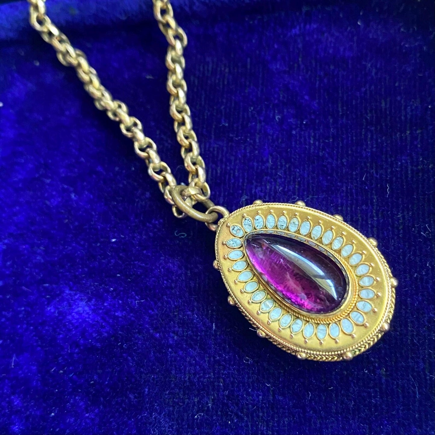Antique Victorian Etruscan Revival Foiled Teardrop Amethyst Pendant with White Enamel Halo & Hair Locket Reverse in High Karat Gold circa 1870, 1800's, Granulation, Castellani, 15k
