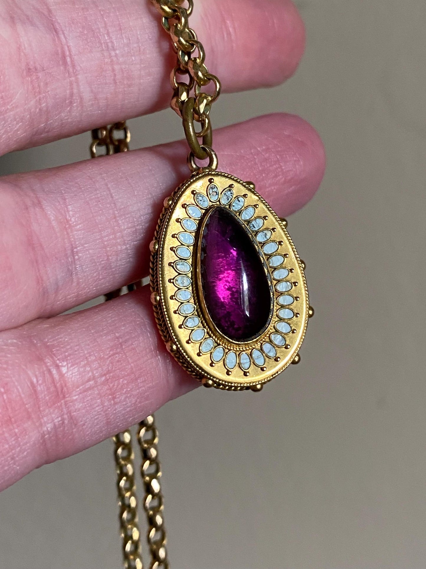 Antique Victorian Etruscan Revival Foiled Teardrop Amethyst Pendant with White Enamel Halo & Hair Locket Reverse in High Karat Gold circa 1870, 1800's, Granulation, Castellani, 15k